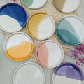 platos de colores reaglo artesania azul miel verde morado rosa naranja maia ceramics
